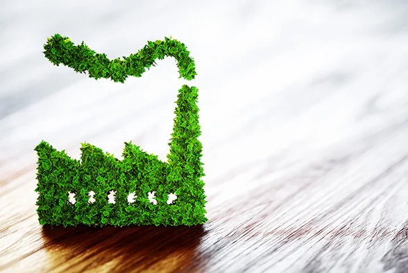 Silhouette einer Fabrik aus Blättern gemacht